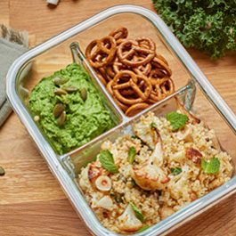 Roasted cauliflower tabbouleh with kale hummus & pumpkin seeds