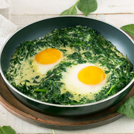 Shakshuka with spinach and goat cheese