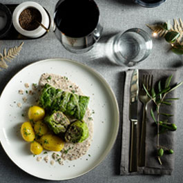 Savoy cabbage roulades with mushroom-herb-filling