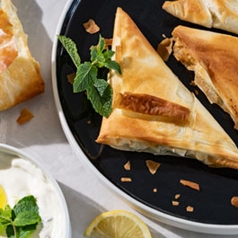 Phyllo samosas with yogurt mint dip