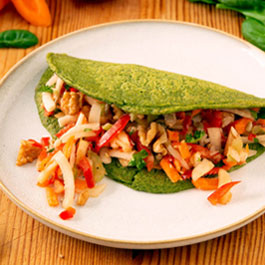 Chickpea pancakes with colourful shredded salad