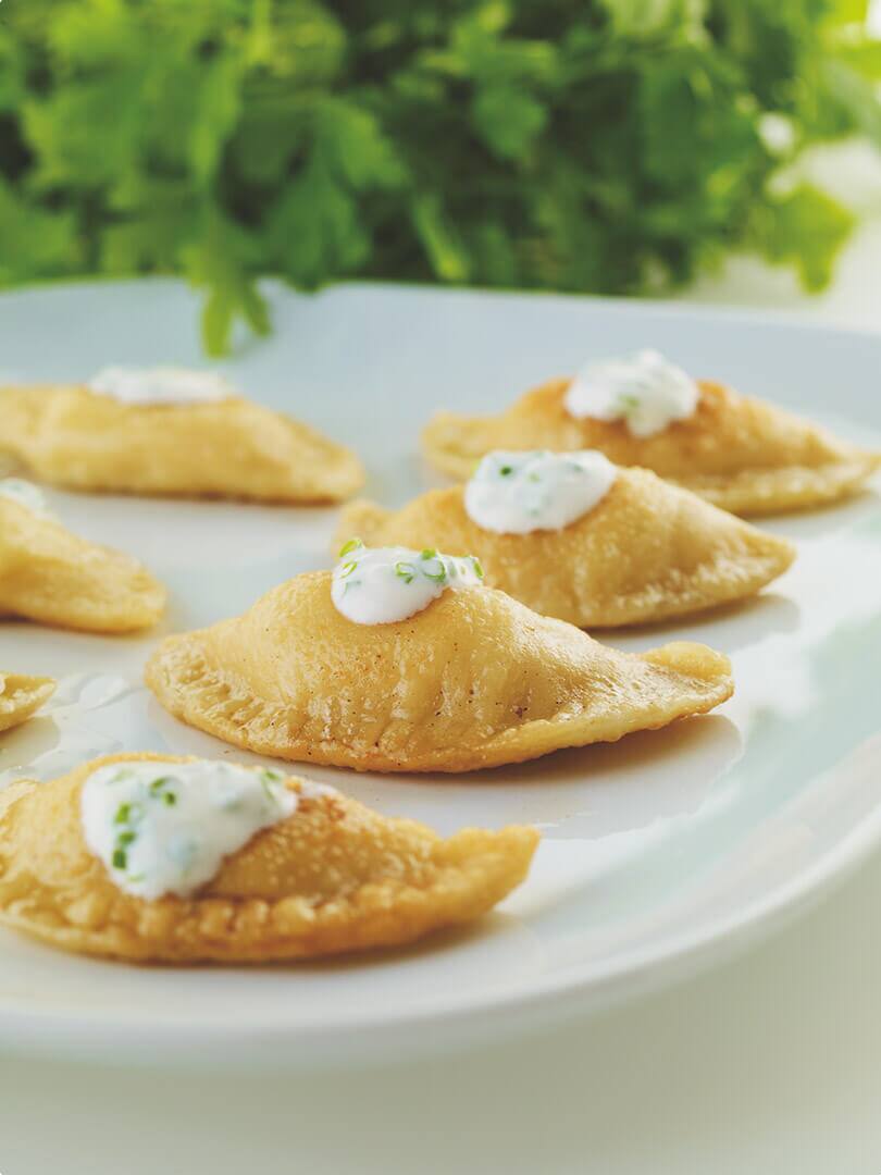 Pierogi with potato and cream cheese filling.