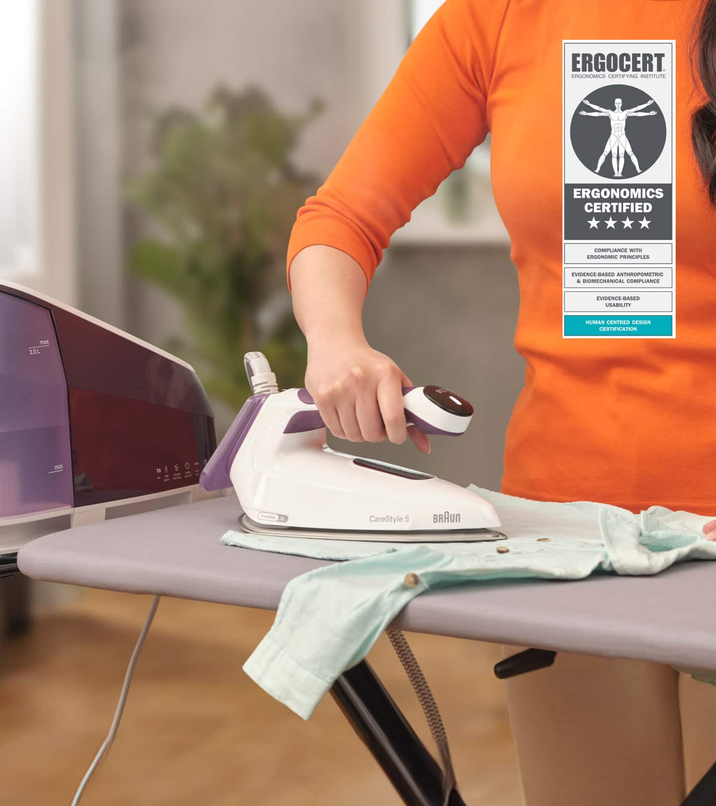 Braun CareStyle 5 Steam generating iron, purple, in use . Badge "Ergonomics certified" by ERGOCERT in right top corner