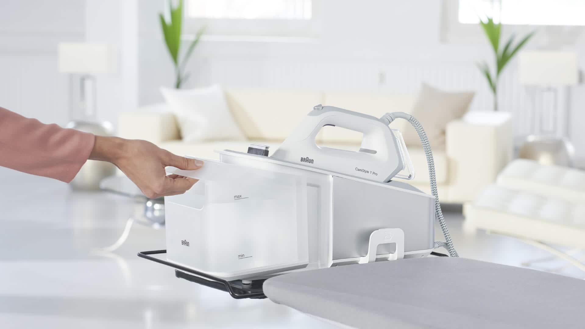 Braun CareStyle 7 steam generator iron in use